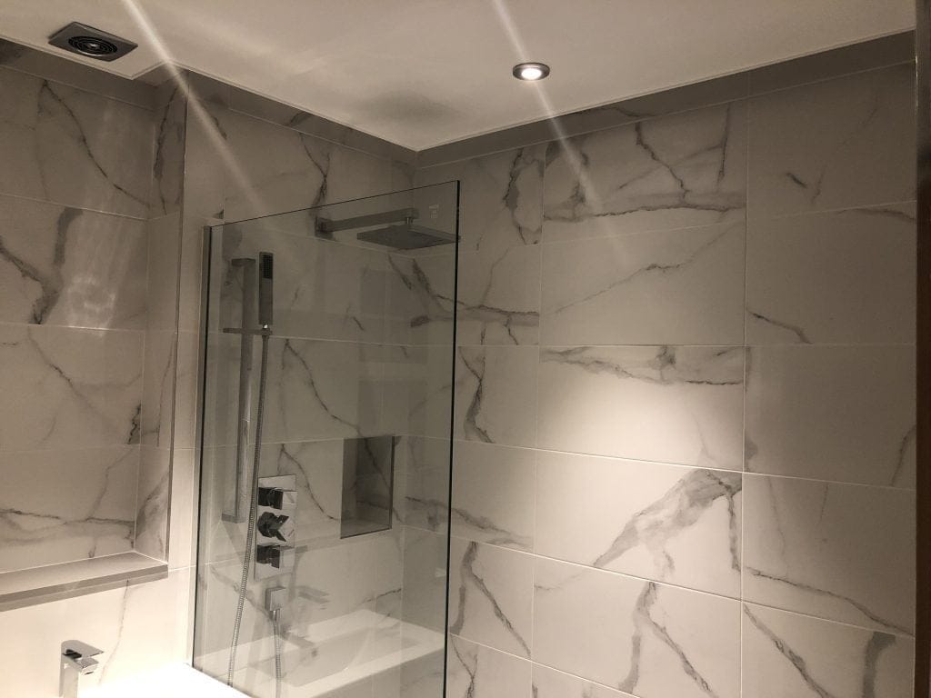 Completed bathroom shower area by INSUREPAIR®